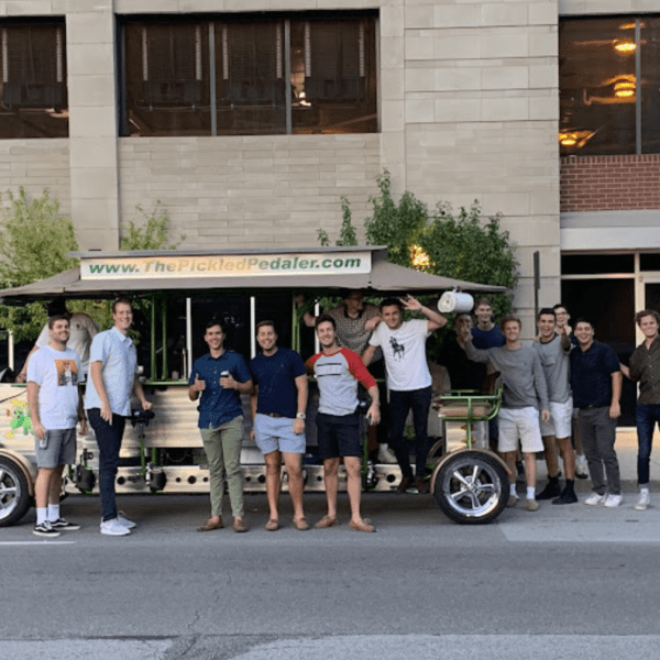 a group of people standing in front of a building